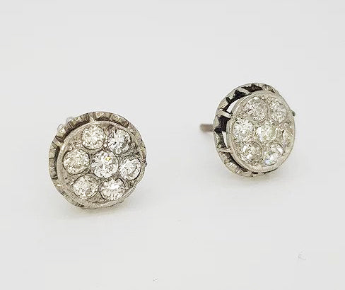 A pair of vintage Diamond Floral Cluster Stud Earrings, 1.80 carat total, mounted in platinum, pierced mount, screw back butterfly fittings