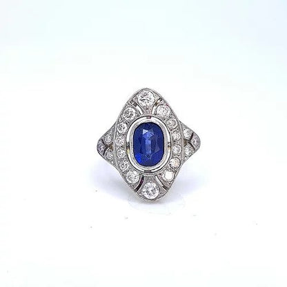 Art Deco Style Sapphire and Diamond Plaque Ring; 2.00ct oval sapphire surrounded by 1.60cts diamonds, millegrain edging, 18ct yellow gold
