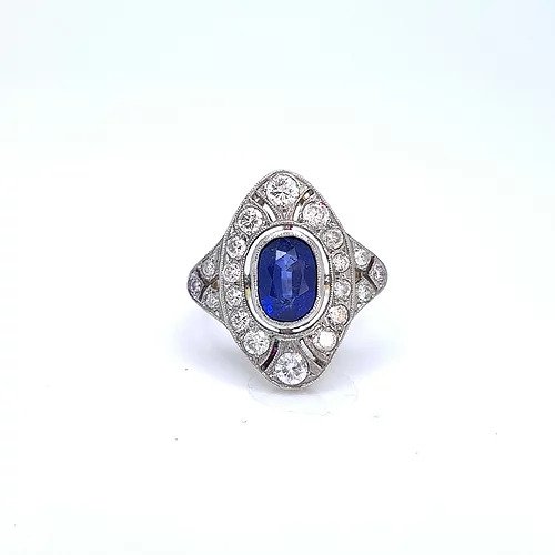 Art Deco Style Sapphire and Diamond Plaque Ring; 2.00ct oval sapphire surrounded by 1.60cts diamonds, millegrain edging, 18ct yellow gold