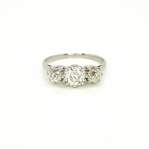 Old Cut Diamond Three Stone Ring; classic trilogy ring set with three old-cut diamonds, 1.00 carat total, claw set, mounted in platinum.