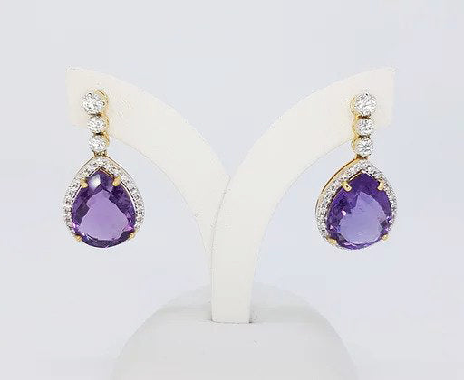 Amethyst and Diamond Drop Earrings; pear-shaped rose-cut amethysts, surrounded by diamonds, graduated diamond set drop, 18ct yellow gold.