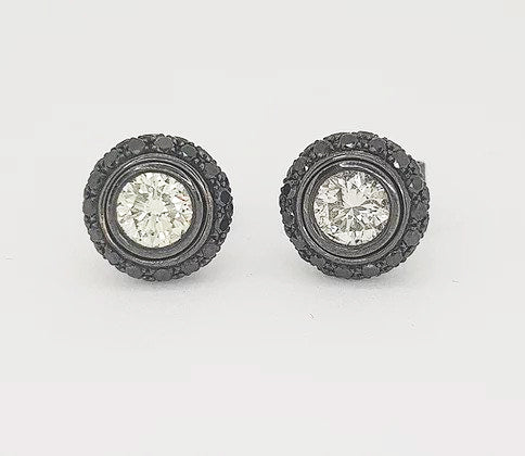White and Black Diamond Halo Detachable Stud Earrings; 0.80cts white round brilliant-cut diamonds surrounded by 0.96cts carved black diamond