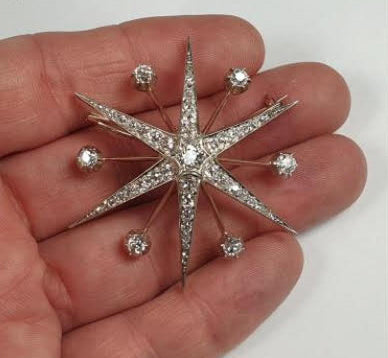 Antique Victorian 4.10ct Diamond Star Brooch; six radial star with satellite diamonds set in silver and gold, 4.10 carat total, with detachable fittings