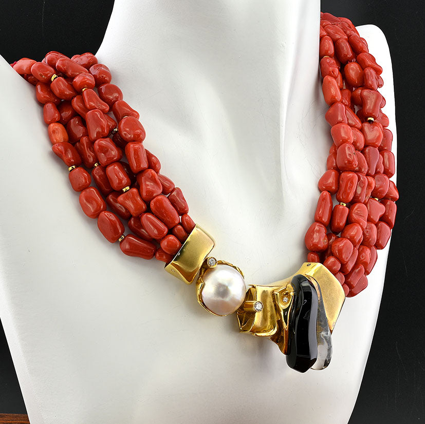 Misani Milano Natural Red Sardinia Coral Necklace, 6 intertwined strands of natural Italian Red Sardinia coral with 18ct yellow gold clasp set with diamonds, mabe pearl, black onyx and rock crystal, Circa 1980