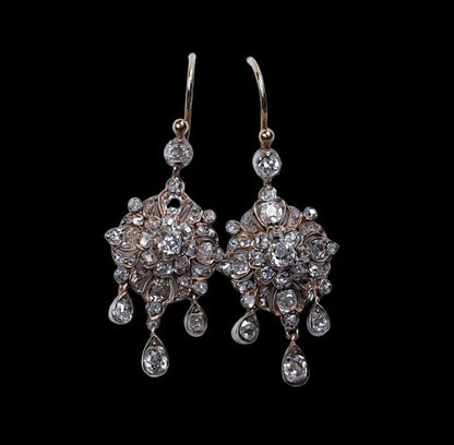 Antique Old Mine Cut Diamond Cluster Drop Earrings; set with 3cts of old mine cut diamonds in a Tudor rose cluster design with three cascading diamond drops, Circa 1840