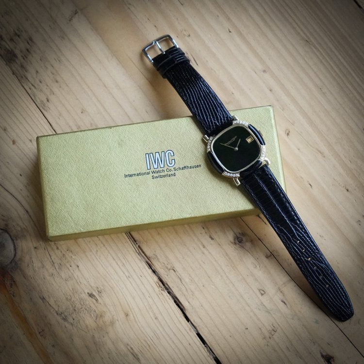 Vintage ladies IWC Schaffhausen 18ct Yellow Gold Watch with Black Face and Diamond and Onyx Bezel, Ref 2232671