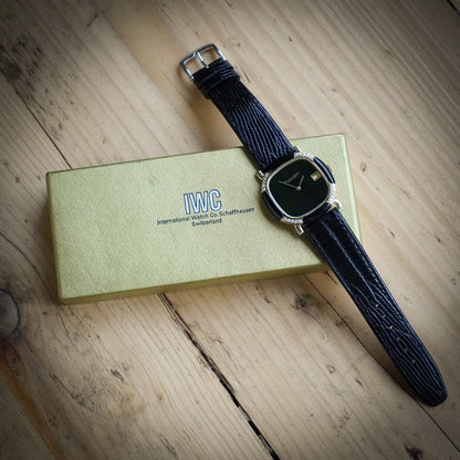 Vintage ladies IWC Schaffhausen 18ct Yellow Gold Watch with Black Face and Diamond and Onyx Bezel, Ref 2232671