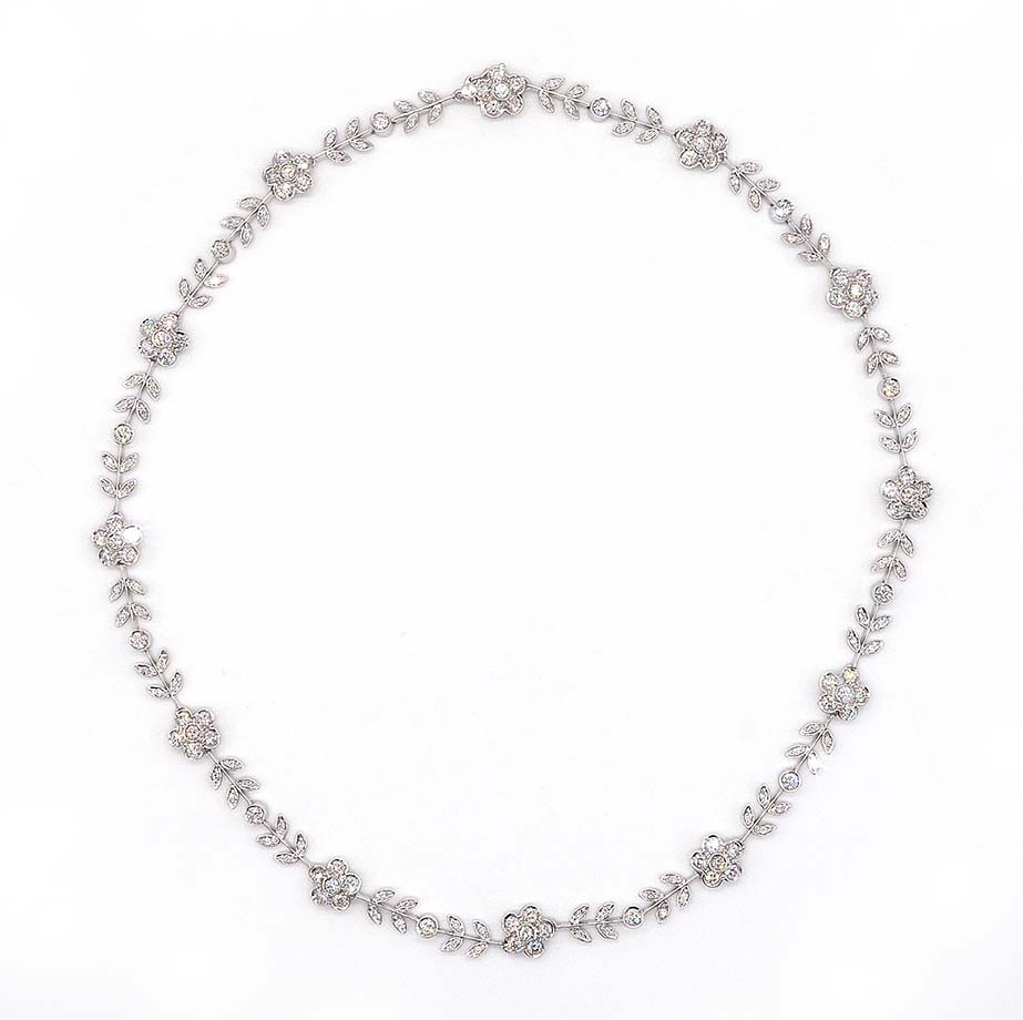 Vintage Italian 6.5ct Diamond Flower Cluster Collar Necklace, G VVS, delicate foliage and daisy flowers combination set with 180 fine quality brilliant-cut diamonds in 18ct white gold. Circa 1990