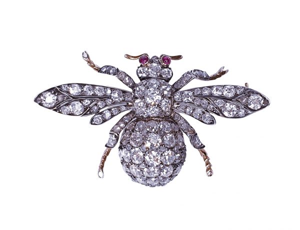 Antique Victorian Old Mine Cut Diamond Bee Brooch; set with 10 carats of old mine cut diamonds with cabochon ruby eyes, in silver and 18ct gold, Circa 1870
