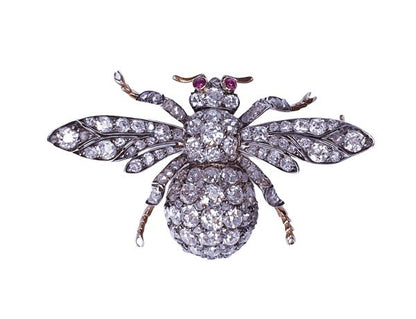 Antique Victorian Old Mine Cut Diamond Bee Brooch; set with 10 carats of old mine cut diamonds with cabochon ruby eyes, in silver and 18ct gold, Circa 1870