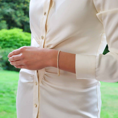 Rub Over Diamond Line Bracelet in 18ct Yellow Gold, 2.88 carat total, 55 round brilliant cut diamonds bezel set in yellow gold, G/H colour with VVS clarity