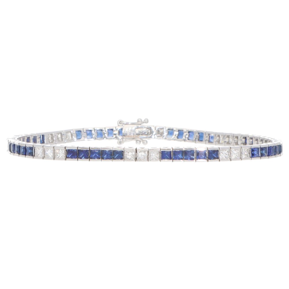 Sapphire and diamond tennis bracelet in white gold.