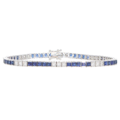 Sapphire and diamond tennis bracelet in white gold.