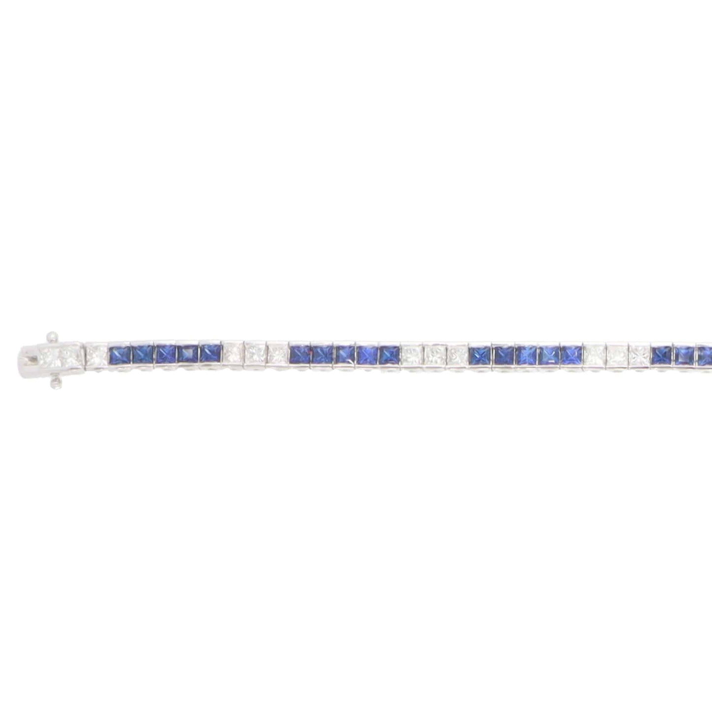 Sapphire and diamond tennis bracelet in white gold.
