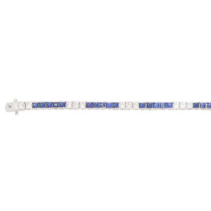 Sapphire and diamond tennis bracelet in white gold.