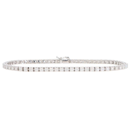 A white gold diamond line bracelet, on a white background