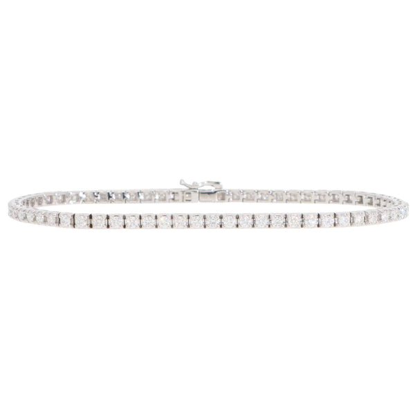 A white gold diamond line bracelet, on a white background