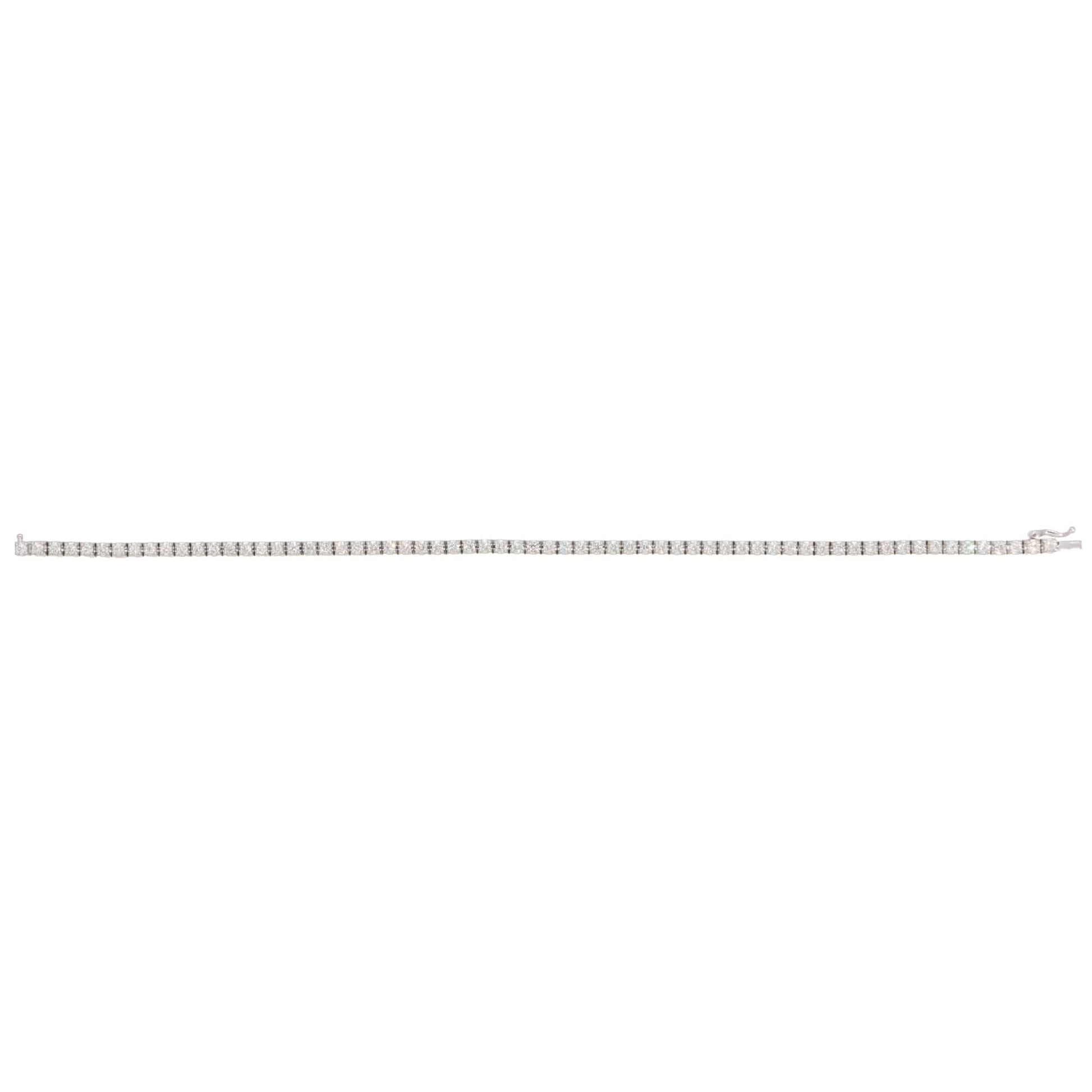 A white gold diamond line bracelet, on a white background