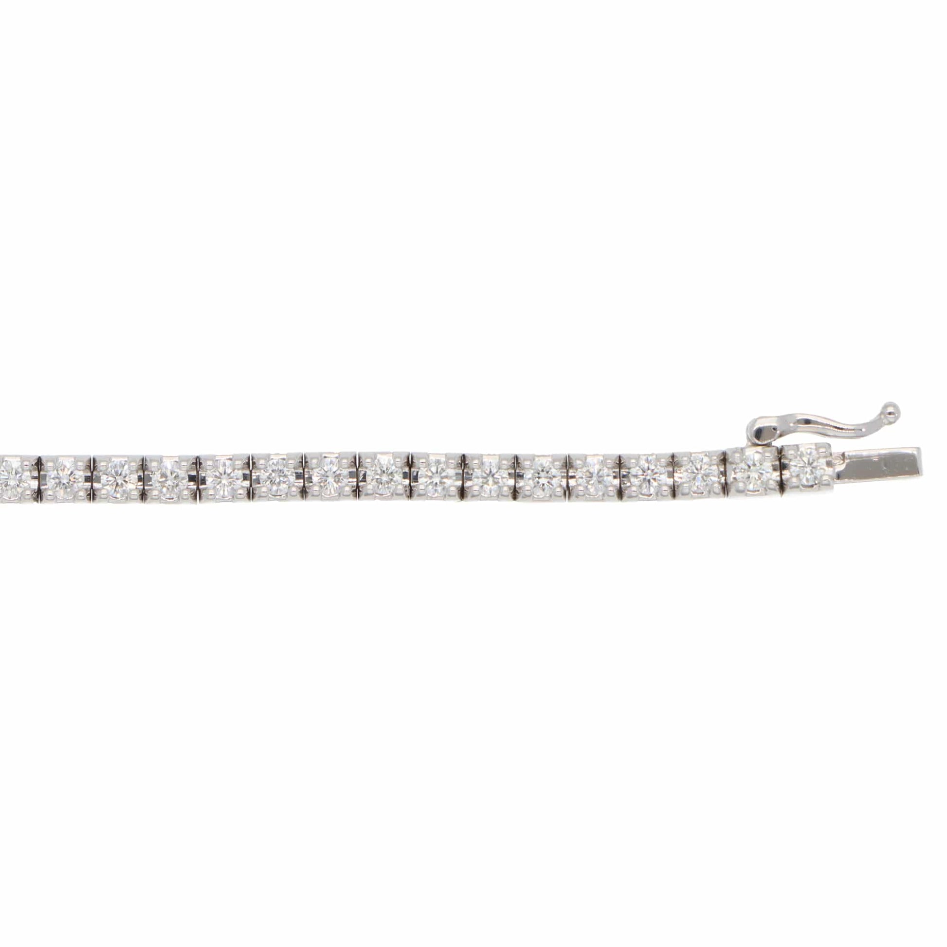 A white gold diamond line bracelet, on a white background