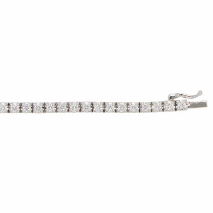 A white gold diamond line bracelet, on a white background