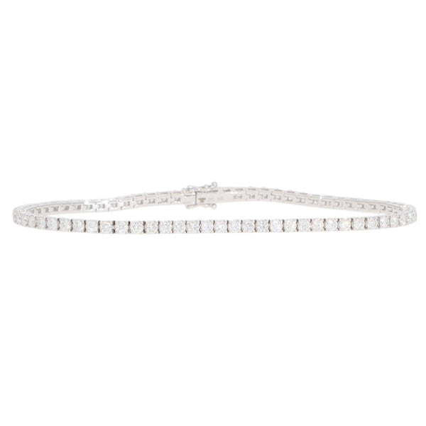 A white gold diamond line bracelet, on a white background