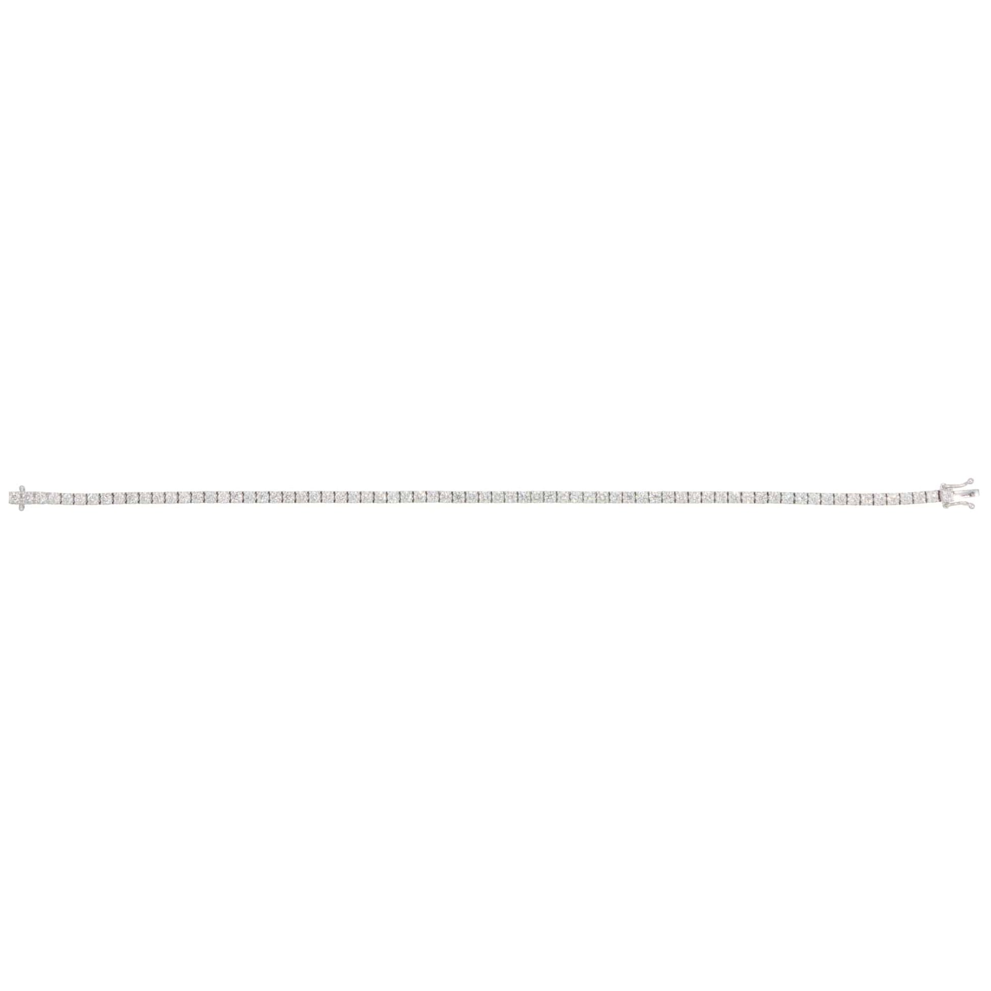 A white gold diamond line bracelet, on a white background