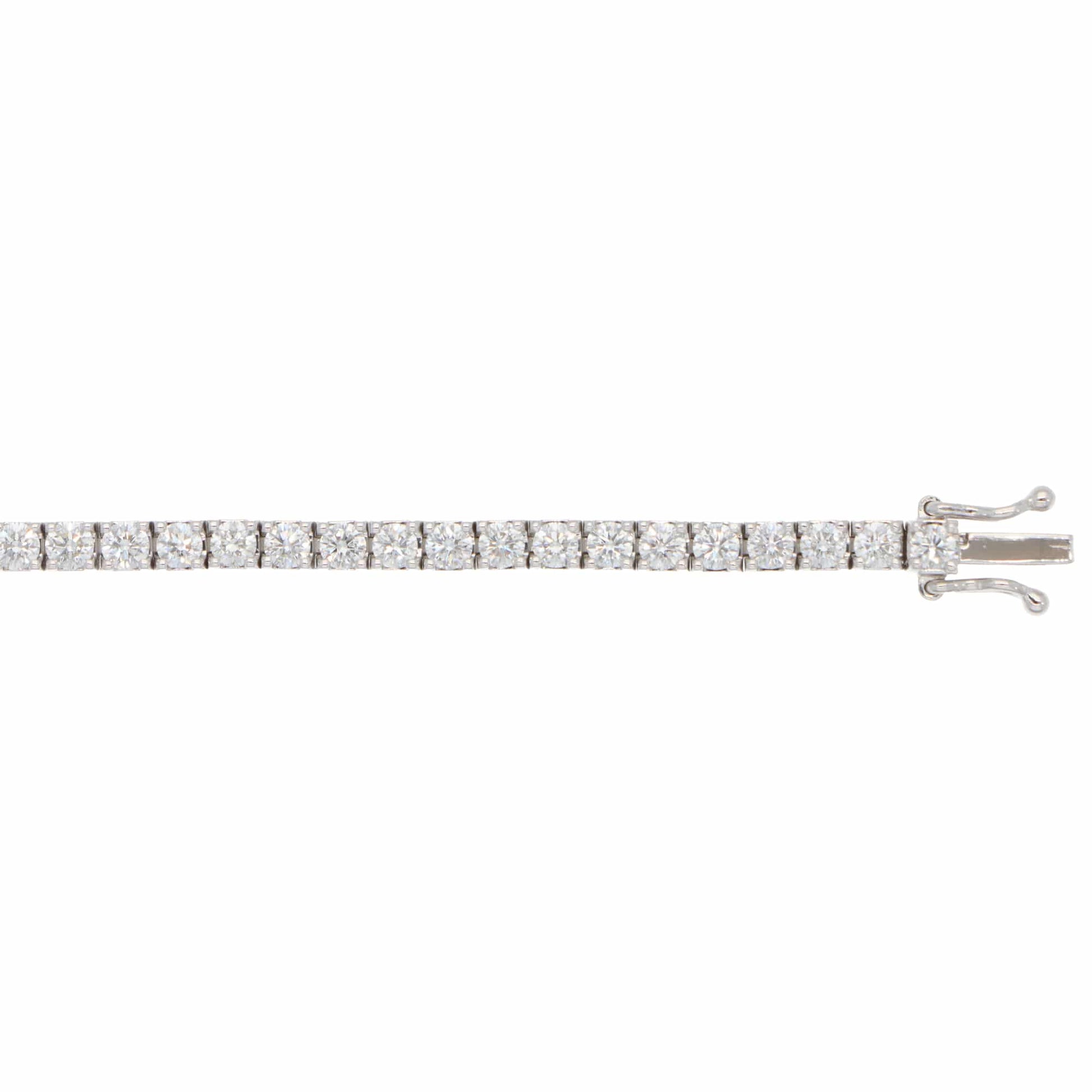 A white gold diamond line bracelet, on a white background