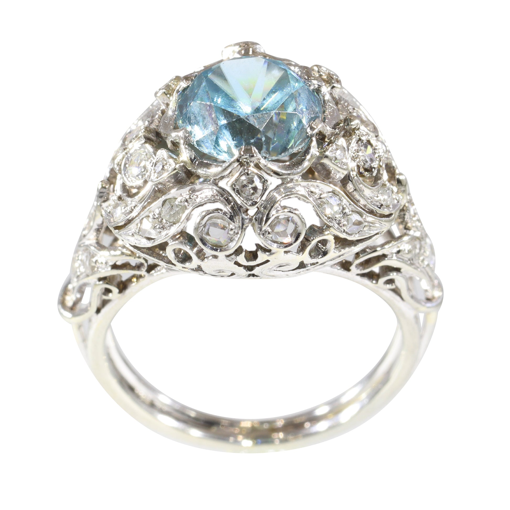 A round blue zircon and diamond openwork ring in platinum