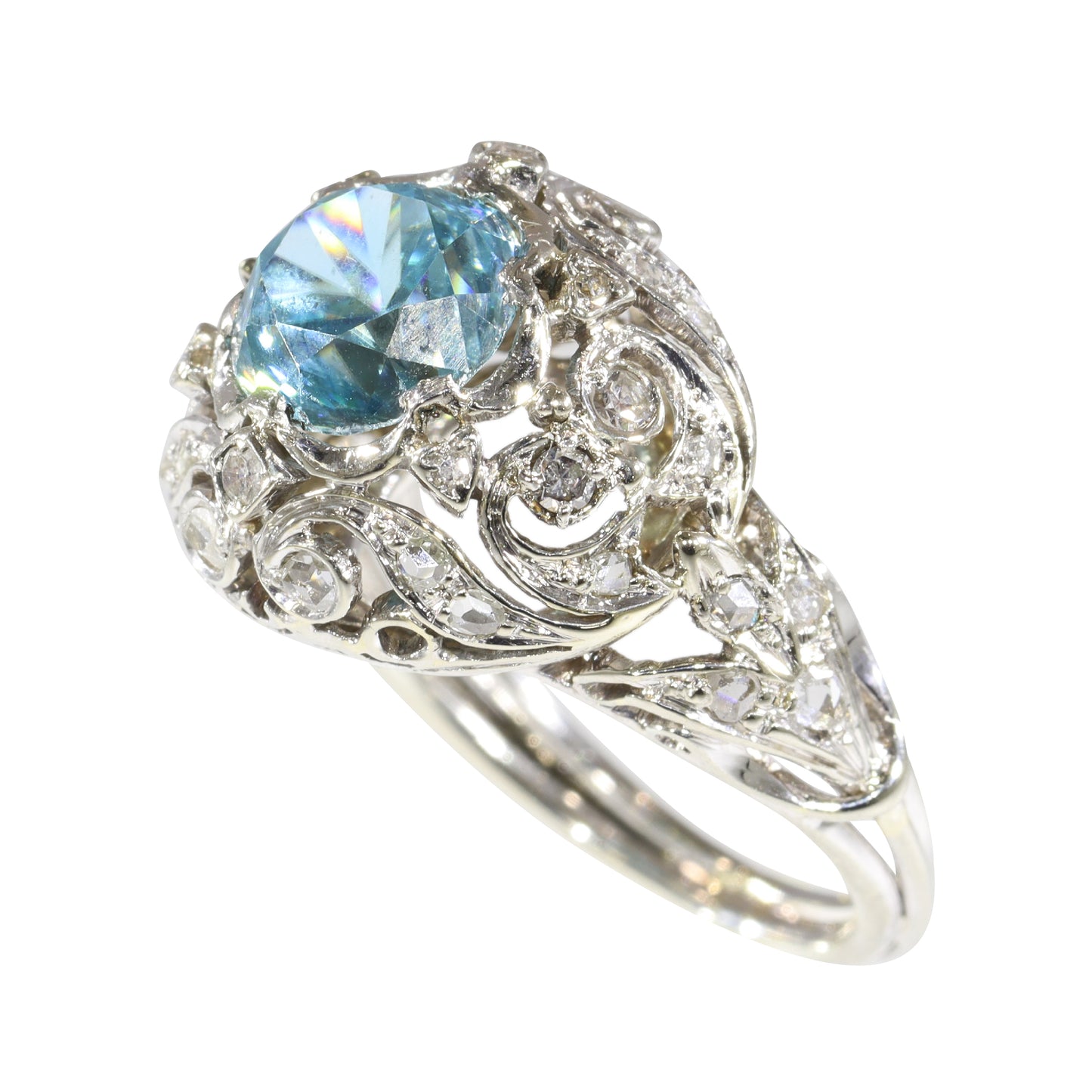 A round blue zircon and diamond openwork ring in platinum