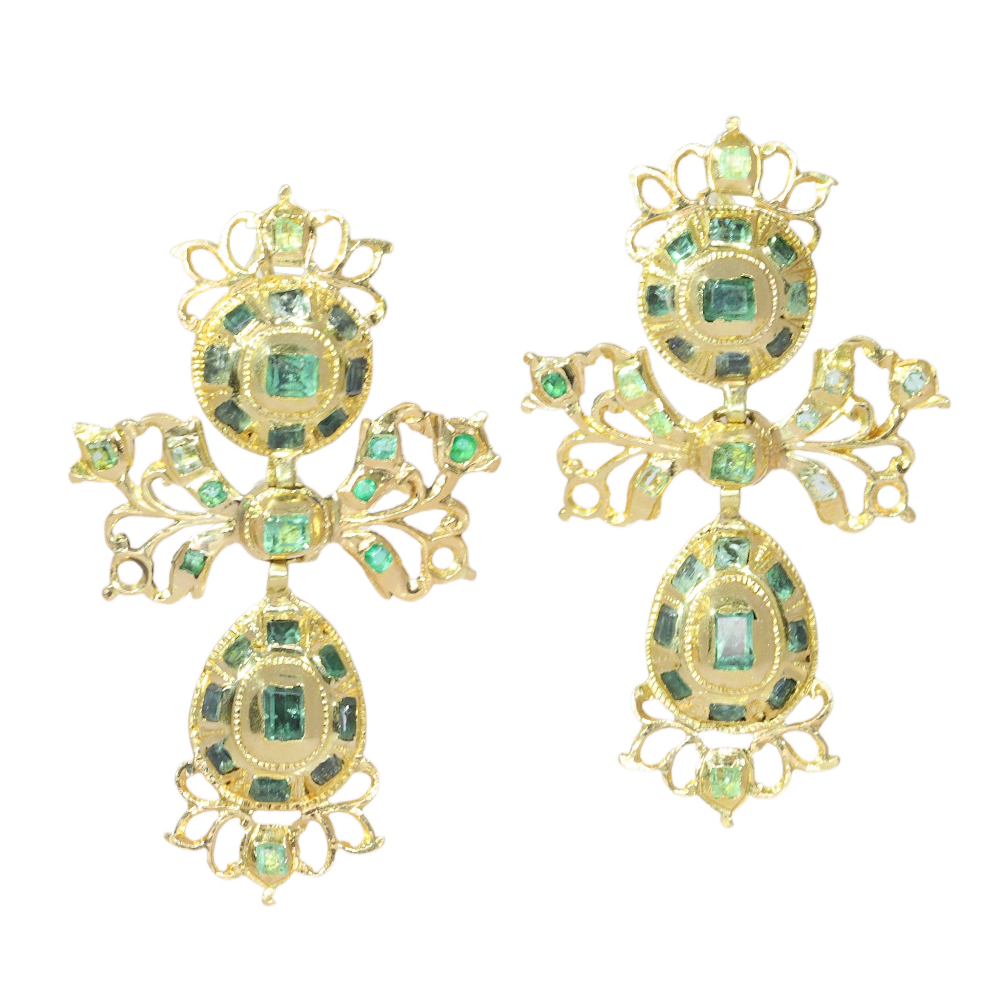 A pair of intricate yellow gold pendant drop earrings set with emeralds