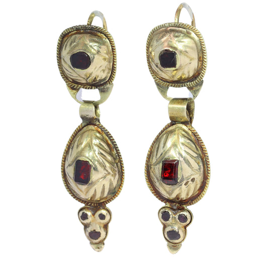 A pair of antique yellow gold double drop earrings with garnets