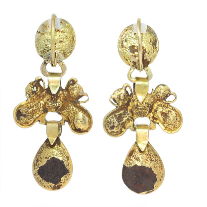 A pair of Iberian drop earrings in yellow gold with garnets