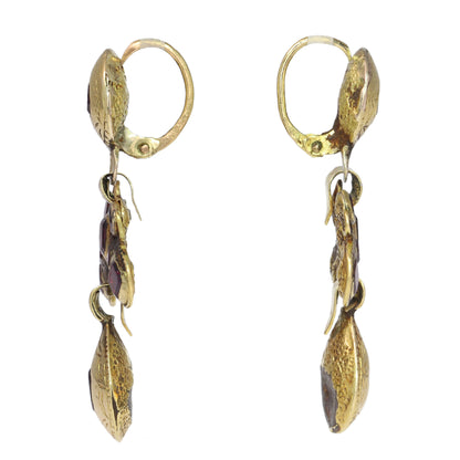 A pair of Iberian drop earrings in yellow gold with garnets