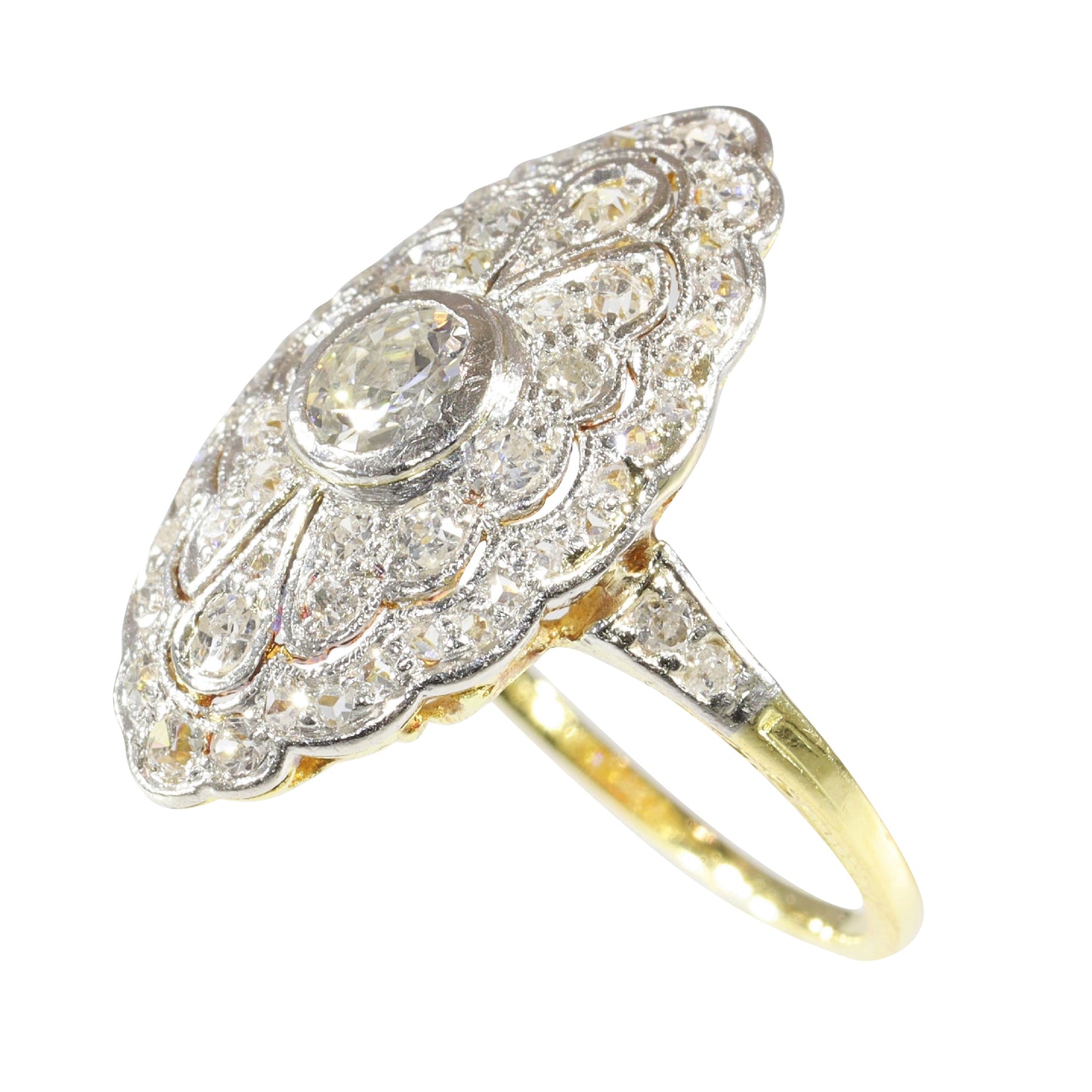 A navette shaped cluster ring set with diamonds in yellow and white gold