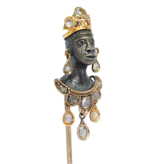 An antique blackamoor head stickpin in gold and silver with rose cut diamond adornments