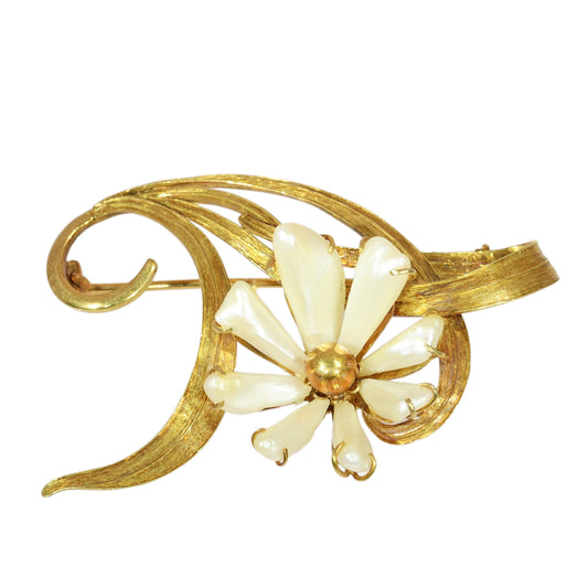 An antique yellow gold flower brooch with elongated white pearls
