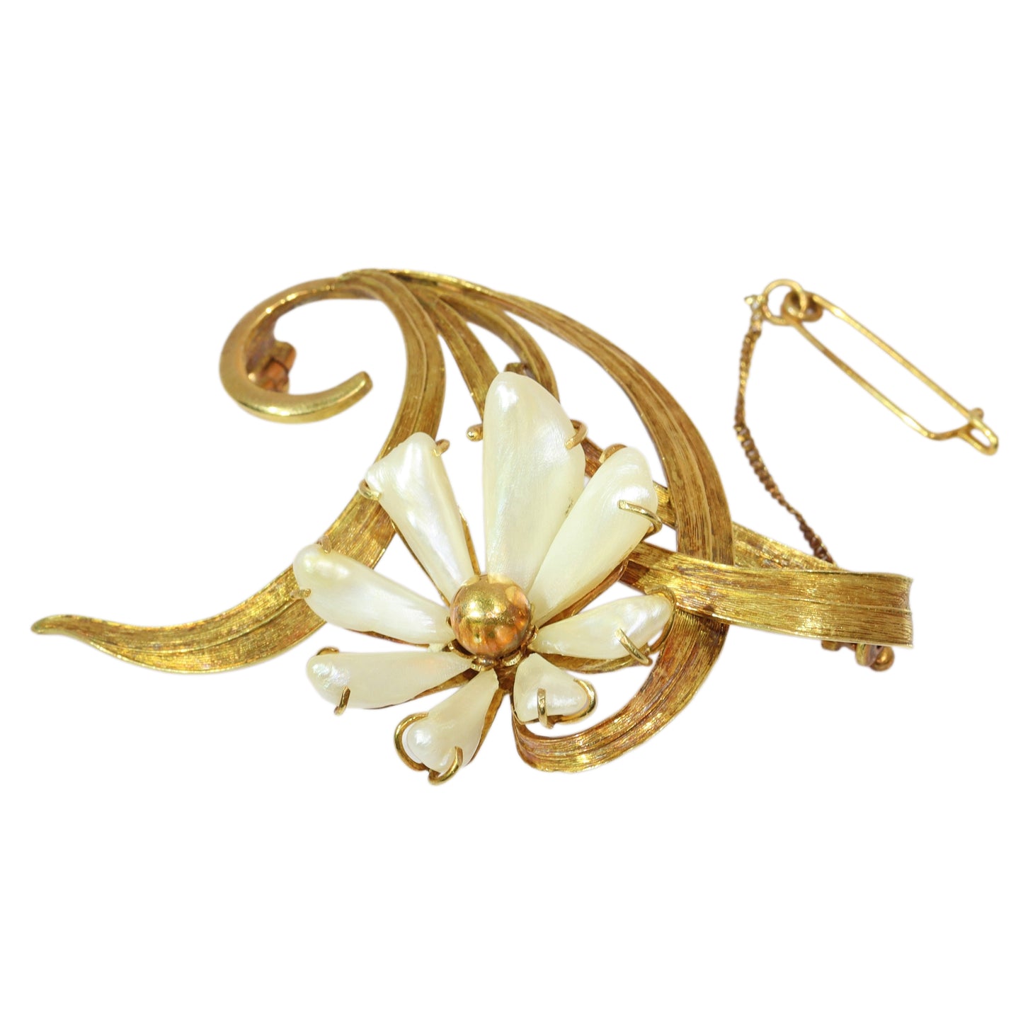 An antique yellow gold flower brooch with elongated white pearls