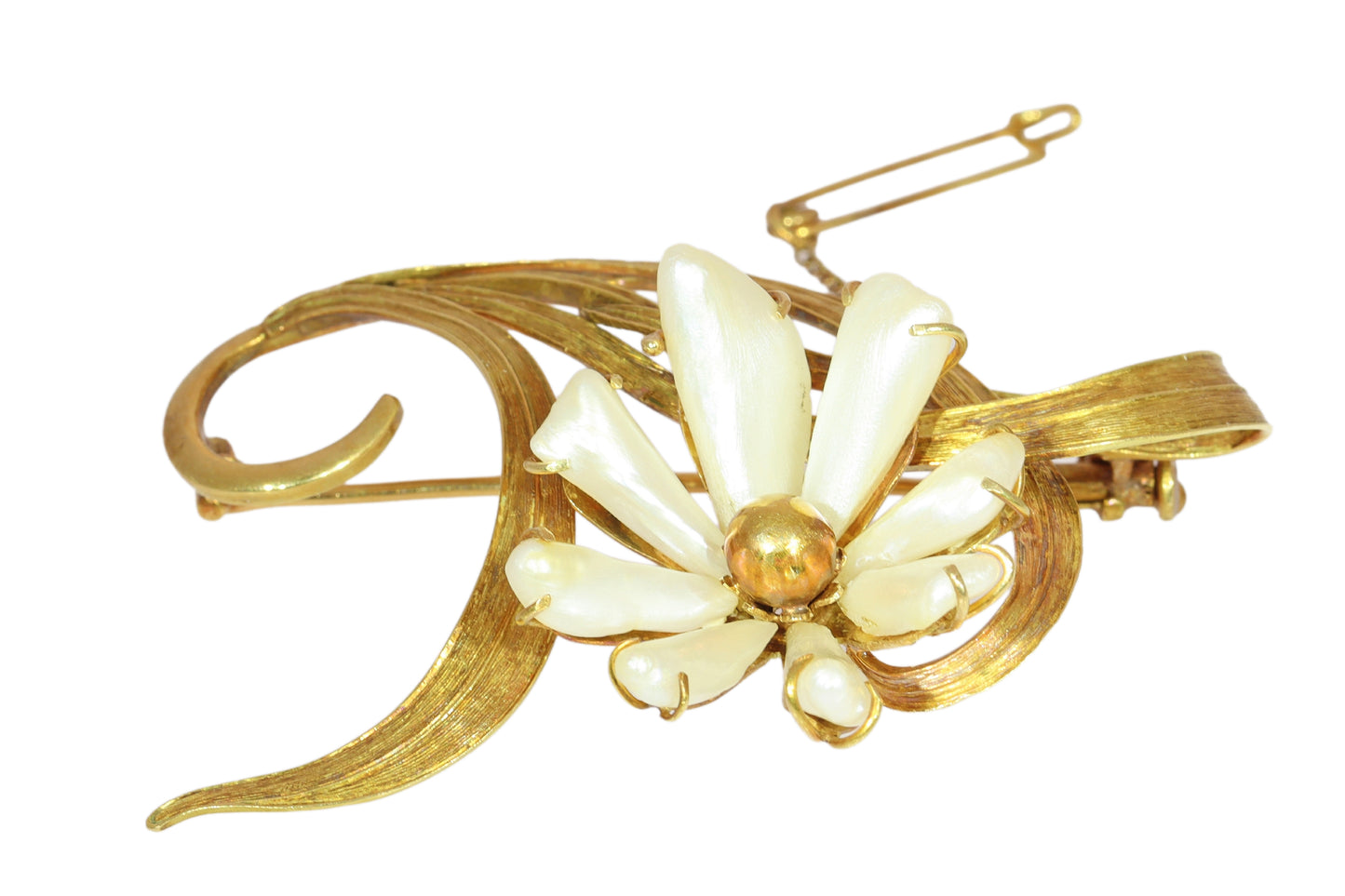 An antique yellow gold flower brooch with elongated white pearls
