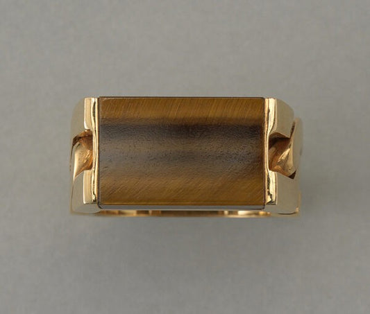 Vintage French Tigers Eye and 18ct Yellow Gold Ring; set with a rectangular tiger eye slab. Made by the French master goldsmith Jean Pierre Brun, Circa 1970