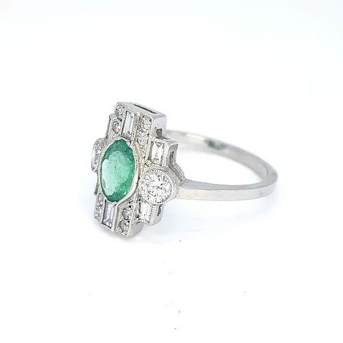 Art Deco Style Emerald and Diamond Plaque Ring; 0.77ct oval emerald surrounded by 0.60cts baguette and round cut diamonds, in 18ct white gold
