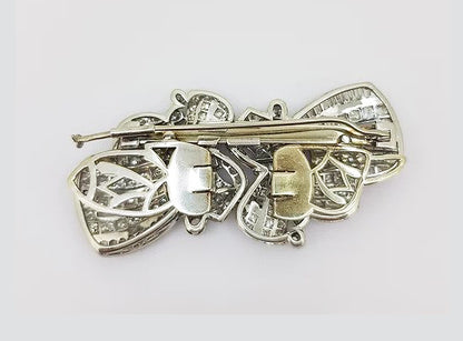 Vintage 10.00ct Diamond Double Clip Bow Brooch; set with baguette and brilliant-cut diamonds, in 18ct white gold.
