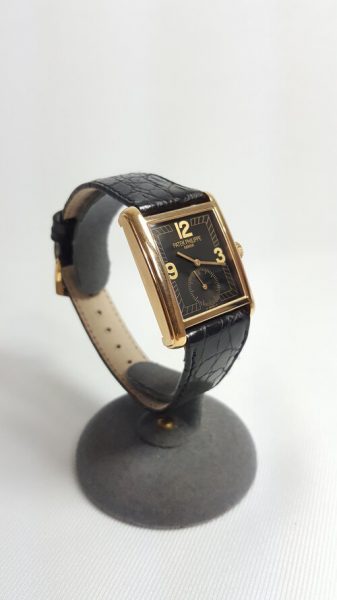 Patek Philippe 5014J Gondolo 18ct Yellow Gold 28mm Manual, black dial, Arabic numerals, small seconds sub-dial at 6, sapphire crystal, leather strap with 18ct yellow gold buckle, Circa 2003, with Original Papers