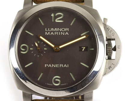 Panerai Luminor Marina Titanium 44mm Automatic; black dial, subsidiary seconds dial, date aperture at 3 o'clock, sapphire crystal glass, with luminous hands and Arabic/baton hour markers, on Panerai light brown leather strap with titanium buckle, with Panerai box and paperwork