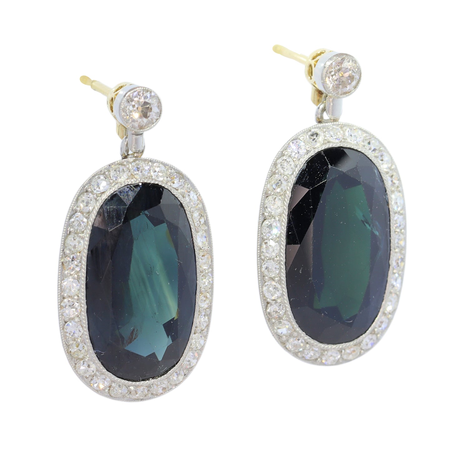 A pair of oval sapphire and diamond cluster drop earrings