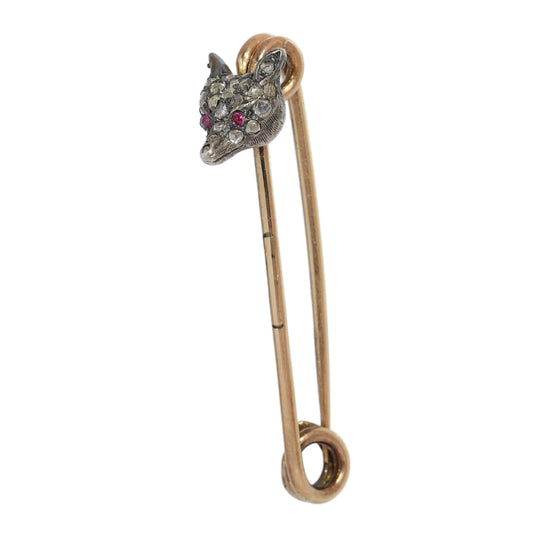 A yellow gold and bar brooch with a silver and diamond set fox head, with red cabochon eyes