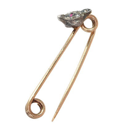 A yellow gold and bar brooch with a silver and diamond set fox head, with red cabochon eyes