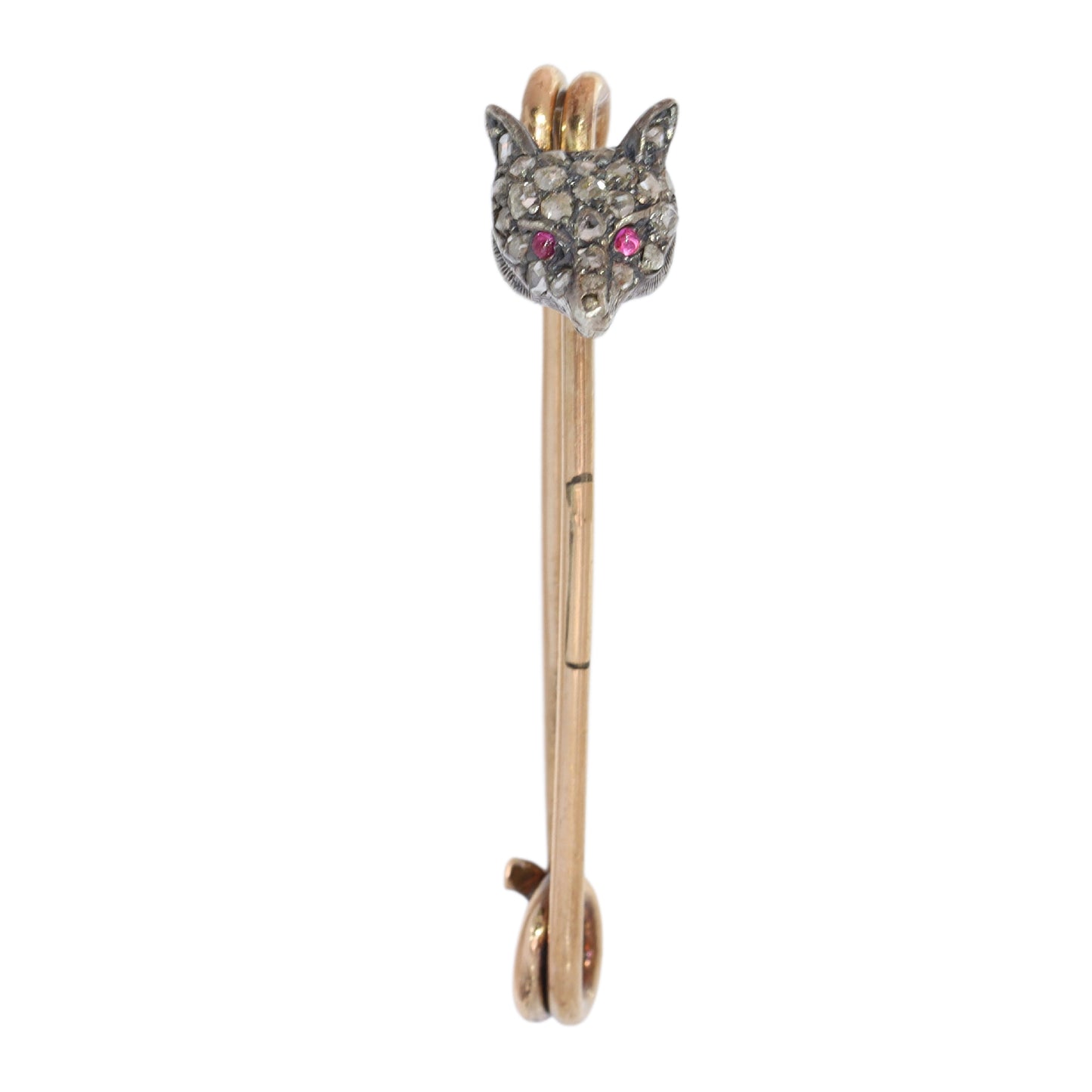 A yellow gold and bar brooch with a silver and diamond set fox head, with red cabochon eyes