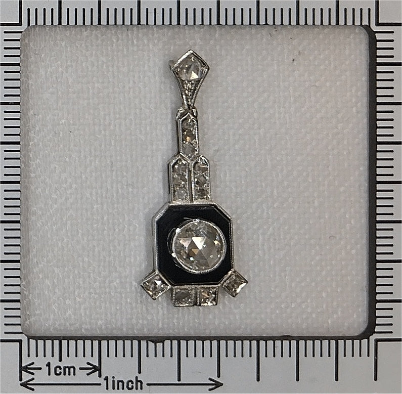 Art Deco pendant, onyx plaque with a prominent rose cut diamond Circa 1930