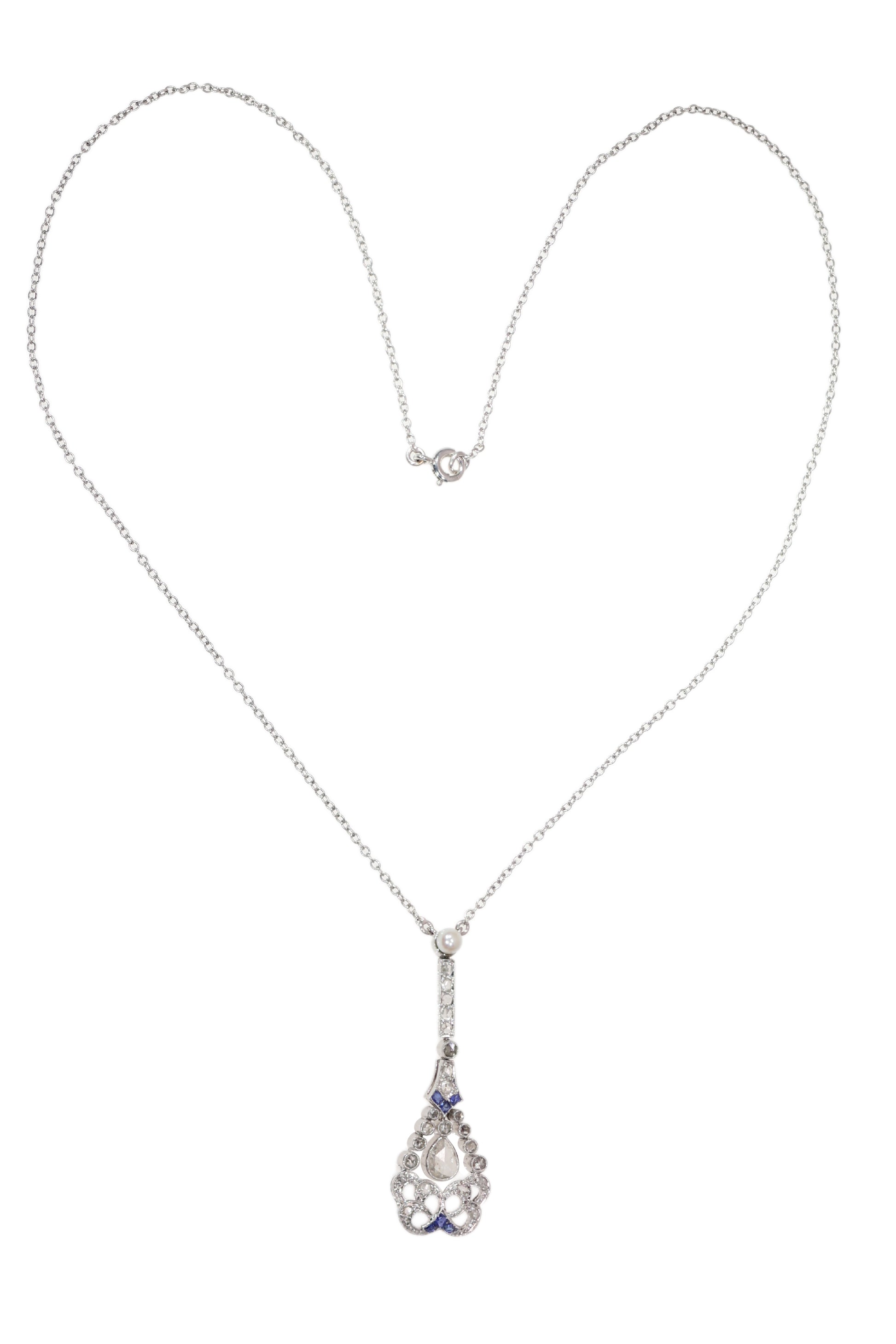 A diamond, sapphire and pearl drop pendant necklace in platinum