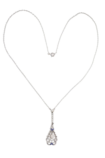 A diamond, sapphire and pearl drop pendant necklace in platinum